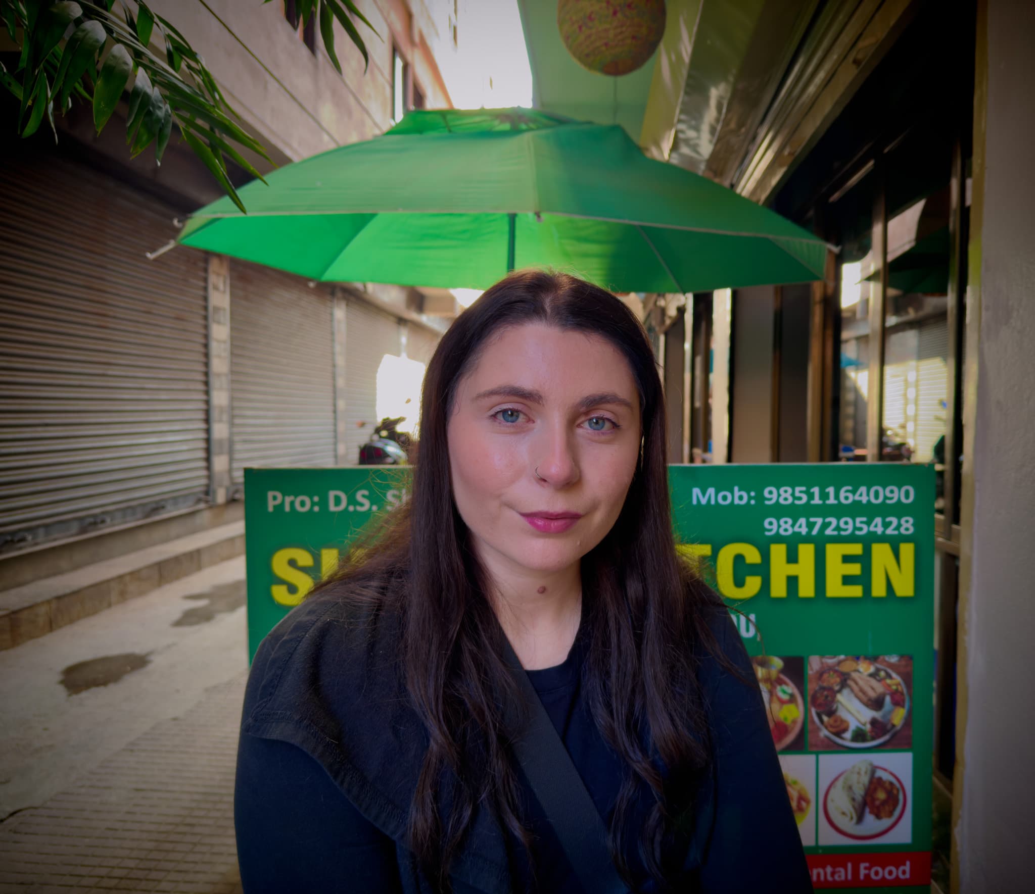 Elena sitting at coffee shop